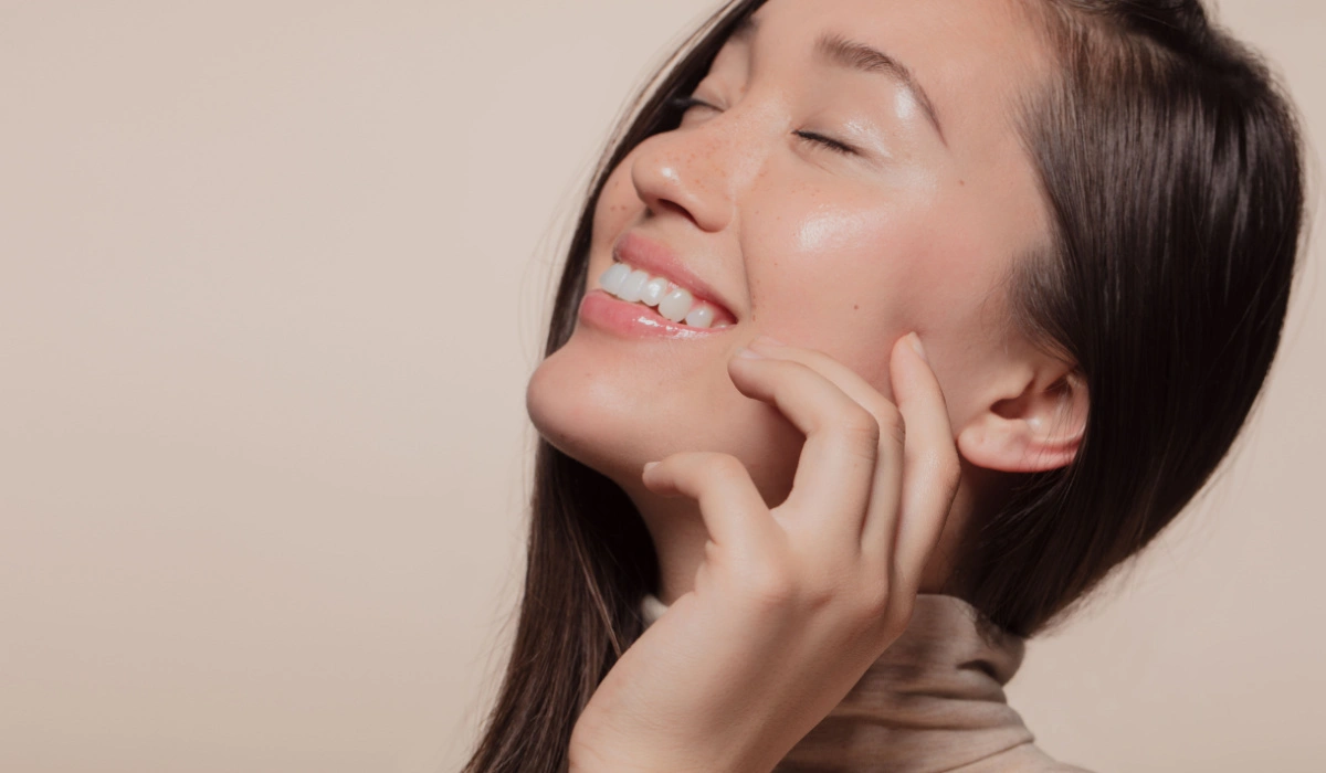 Young woman with flawless and glowing skin