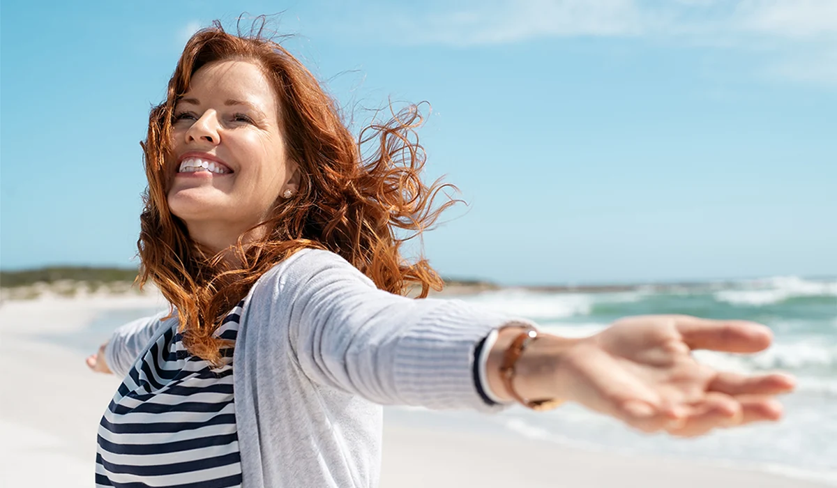 Happy middle-aged woman with radiant skin