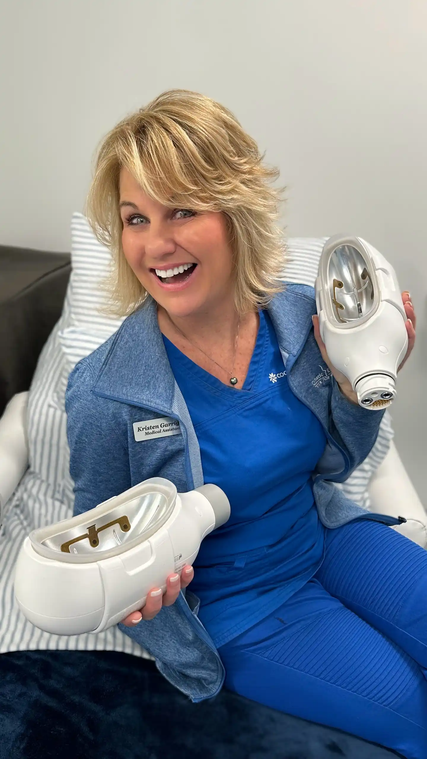 Kristen Garrigan holding the coolsculpting machine